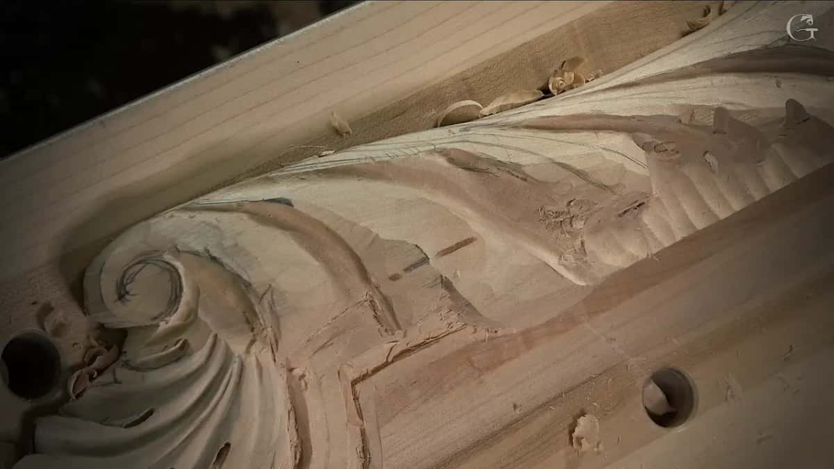 Carved scroll, pale panel
