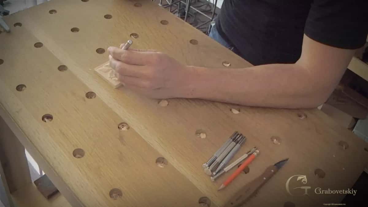 Wide view of the bench, punch held to the rosette
