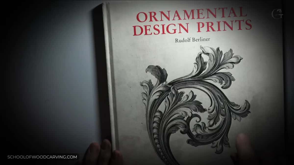 Ornamental Design Prints by Rudolf Berliner, held up to the camera